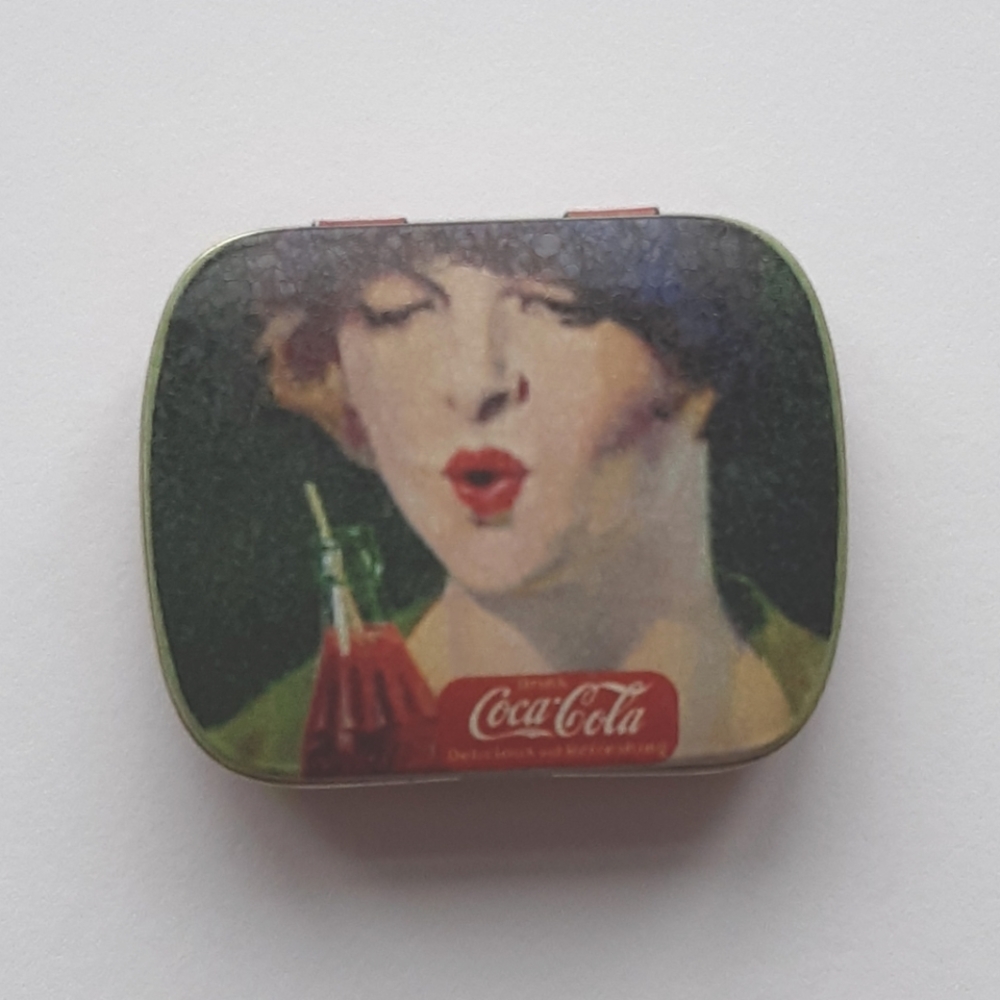 Coca-Cola pill box - lady drinking Coke